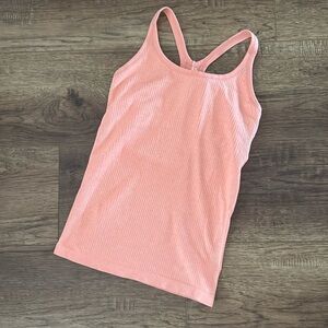 Size 8 ribbed lululemon tank. Padding removed. Too tight in chest area.